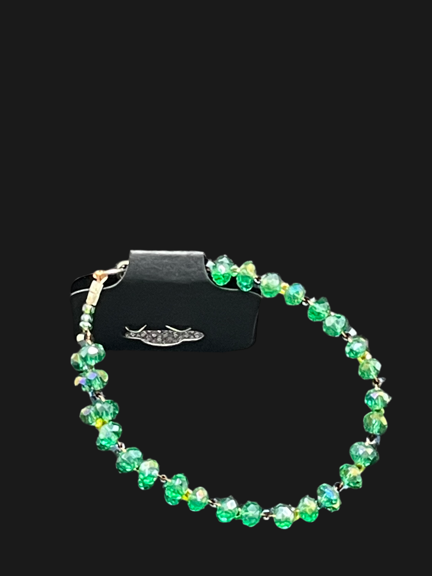 Stylish Green braided Crystal Bracelet - this elegant green crystal bracelet displayed with black background is any girls dream 