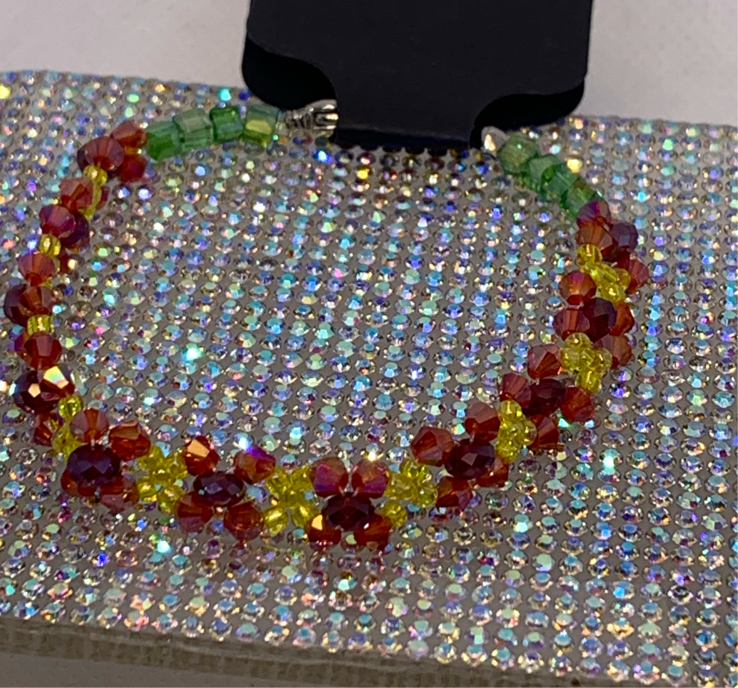 Vibrant Handcrafted Crystal Bracelet – Yellow, Red & Green Floral-Inspired Bead Design