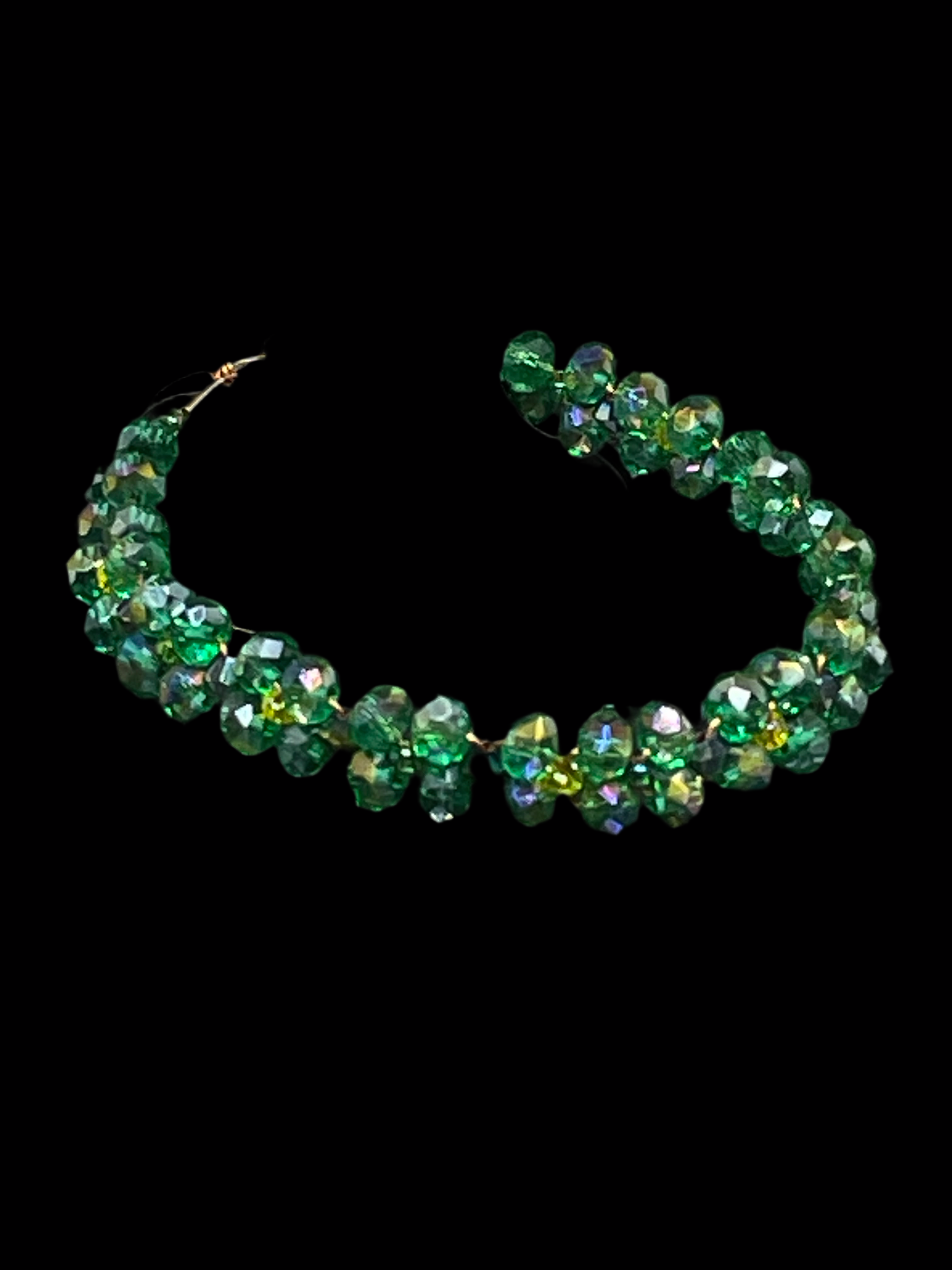 Stylish Green braided Crystal Bracelet - this elegant green crystal bracelet displayed with black background is any girls dream 