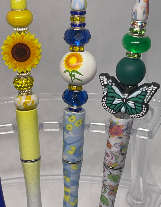 Elegant yellow and blue sunflower and Green Floral Butterfly beaded pen for a nature-inspired touch