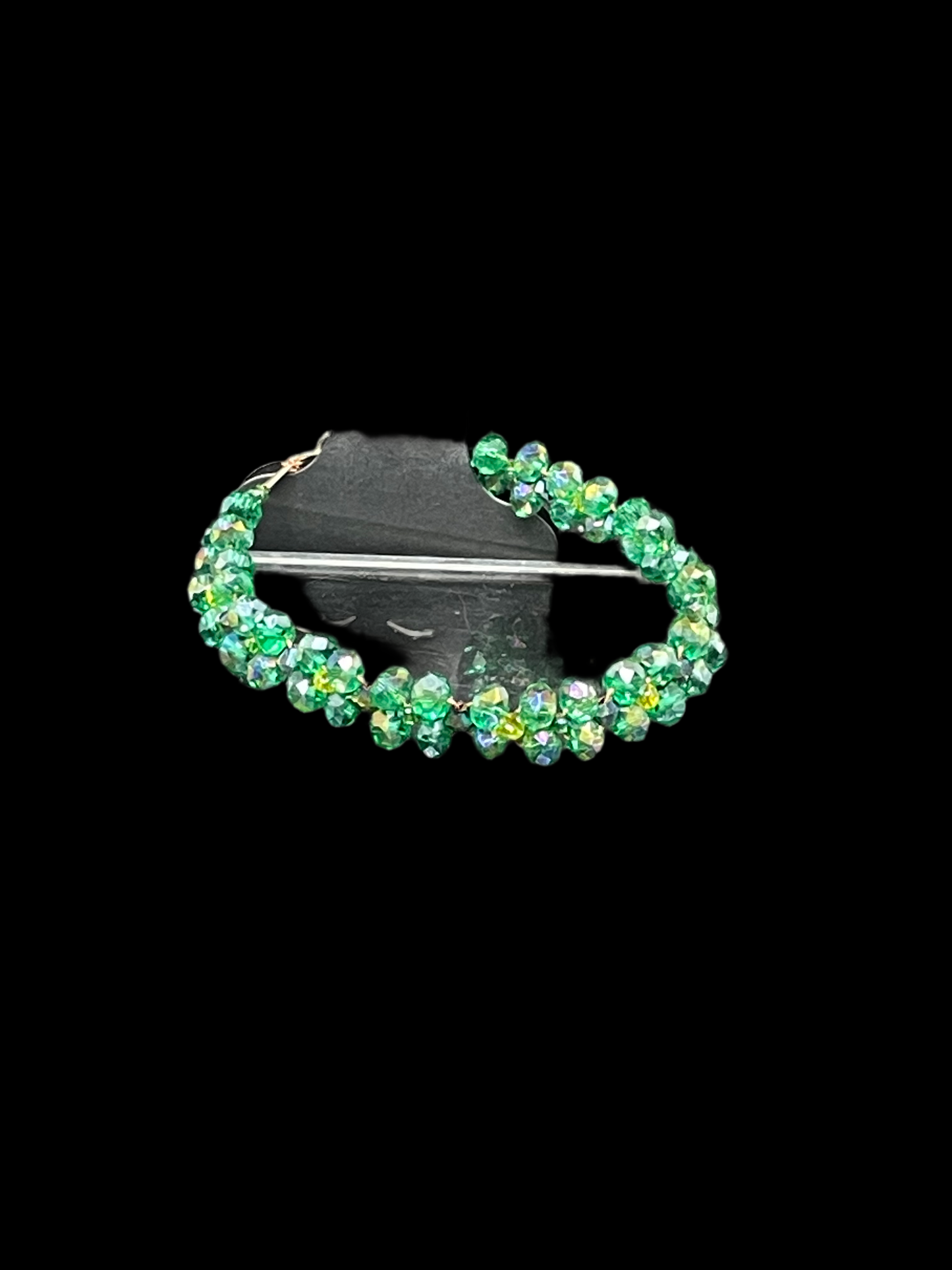 Stylish Green braided Crystal Bracelet - this elegant green crystal bracelet displayed with black background is any girls dream 