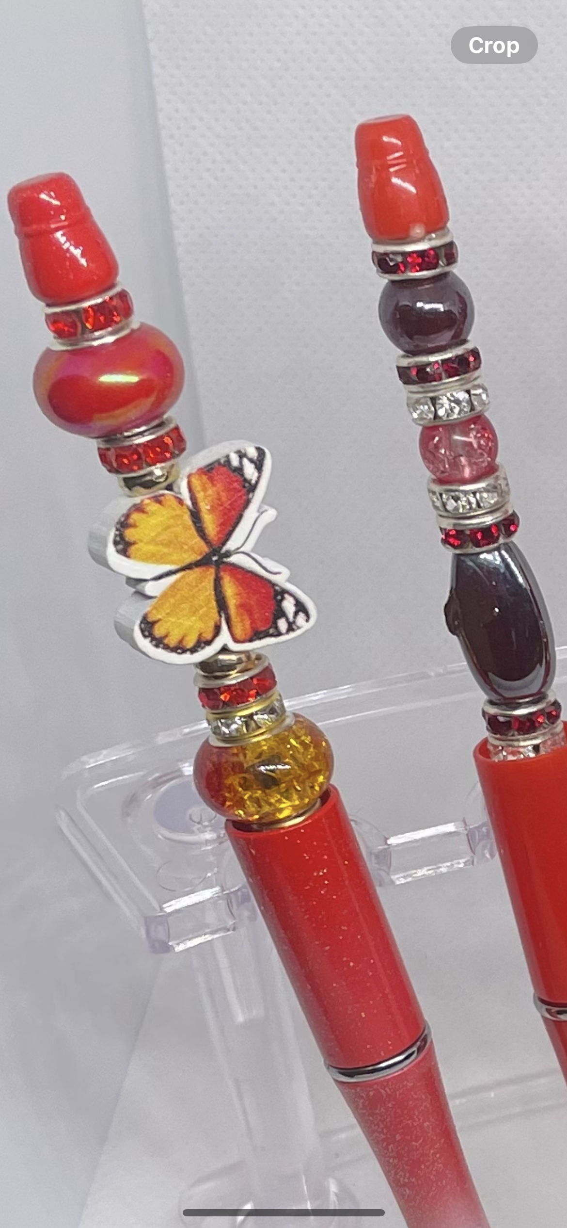 Ruby red beaded pen with shimmering crystals for elegant writing pens have butterfly beads and chunky red  beads and Crystals