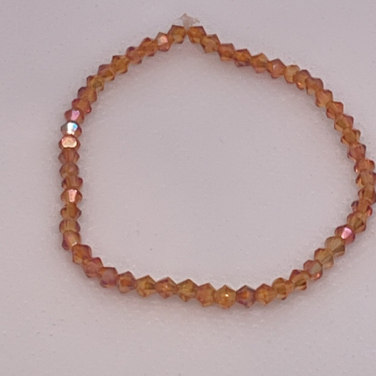 ORANGE BRONZE BICONE AB 3mm
stretchy Crystal Bracelets