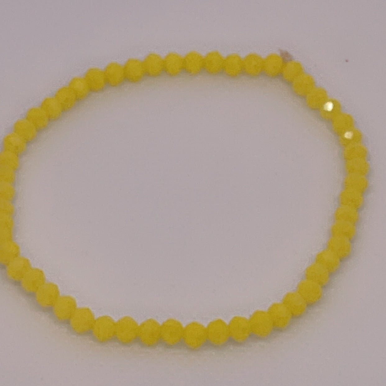 SUN YELLOW ROUND 4mm
Stretchy Bracelet